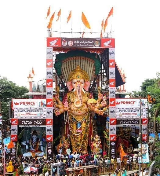 Khairatabad Ganesh mandap surrounded by brand hoardings