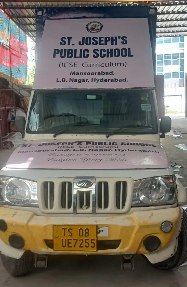 Branded promotional van parked in a residential neighbourhood