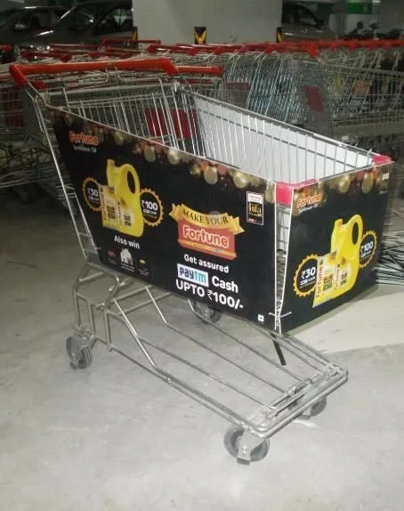 Supermarket trolley branded with an edible oil promotion