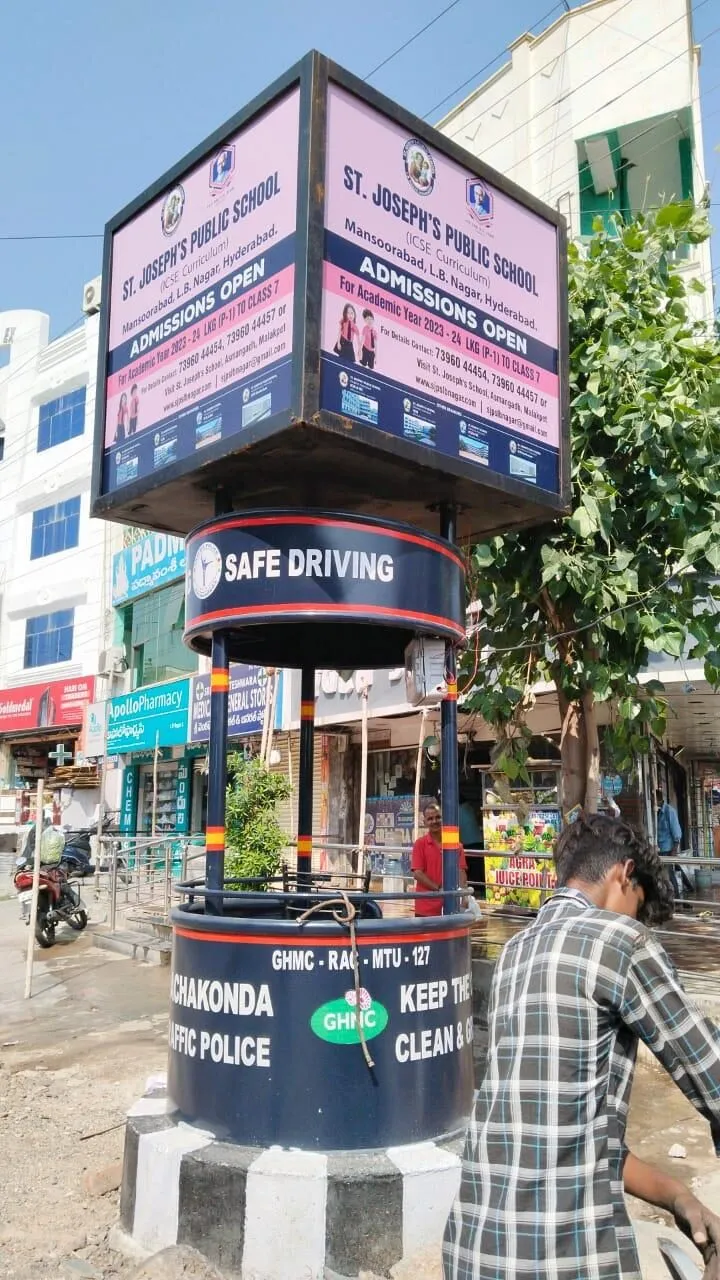 Traffic booth branded with a school admissions campaign